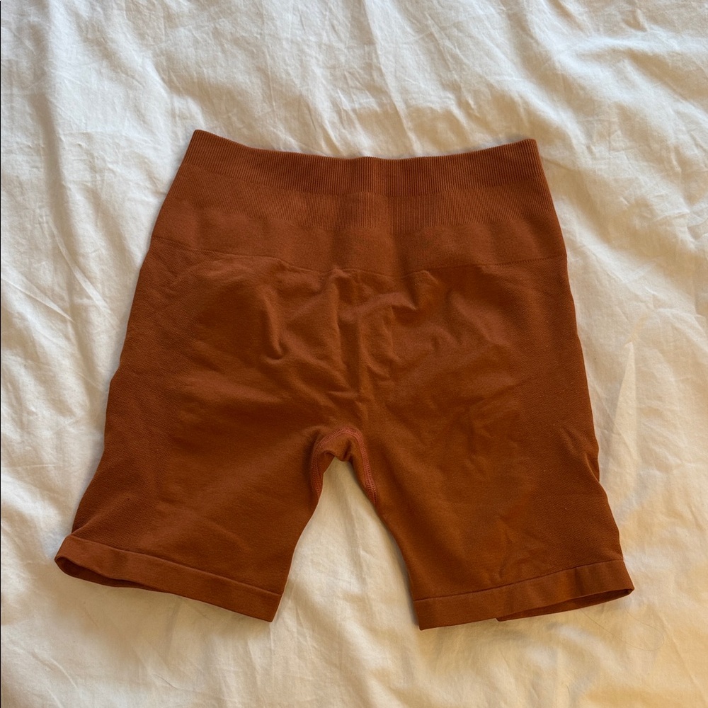 Women’s High-Rise Bike Shorts in Rust Orange